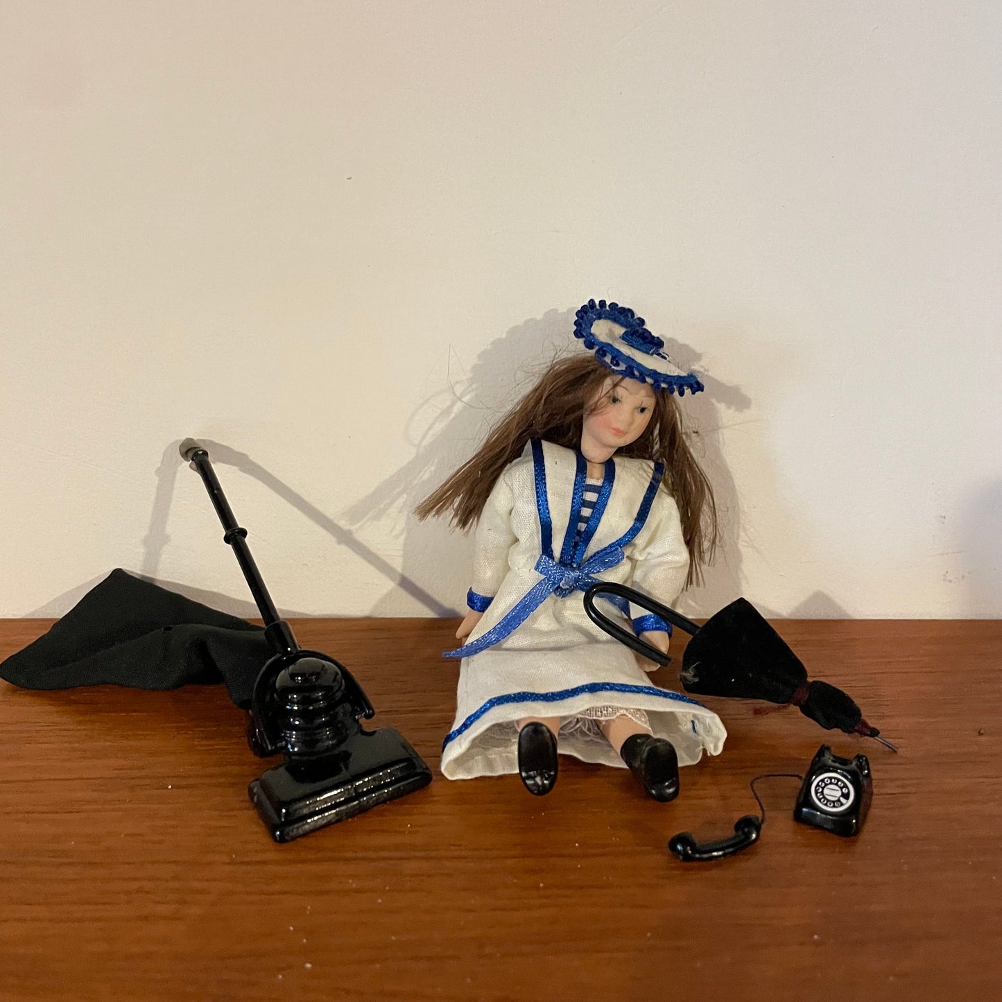 Dolls House Furniture Girl in Sailor Outfit Ceramic with Accessories. Vacuum, Telephone, Parasol, Umbrella