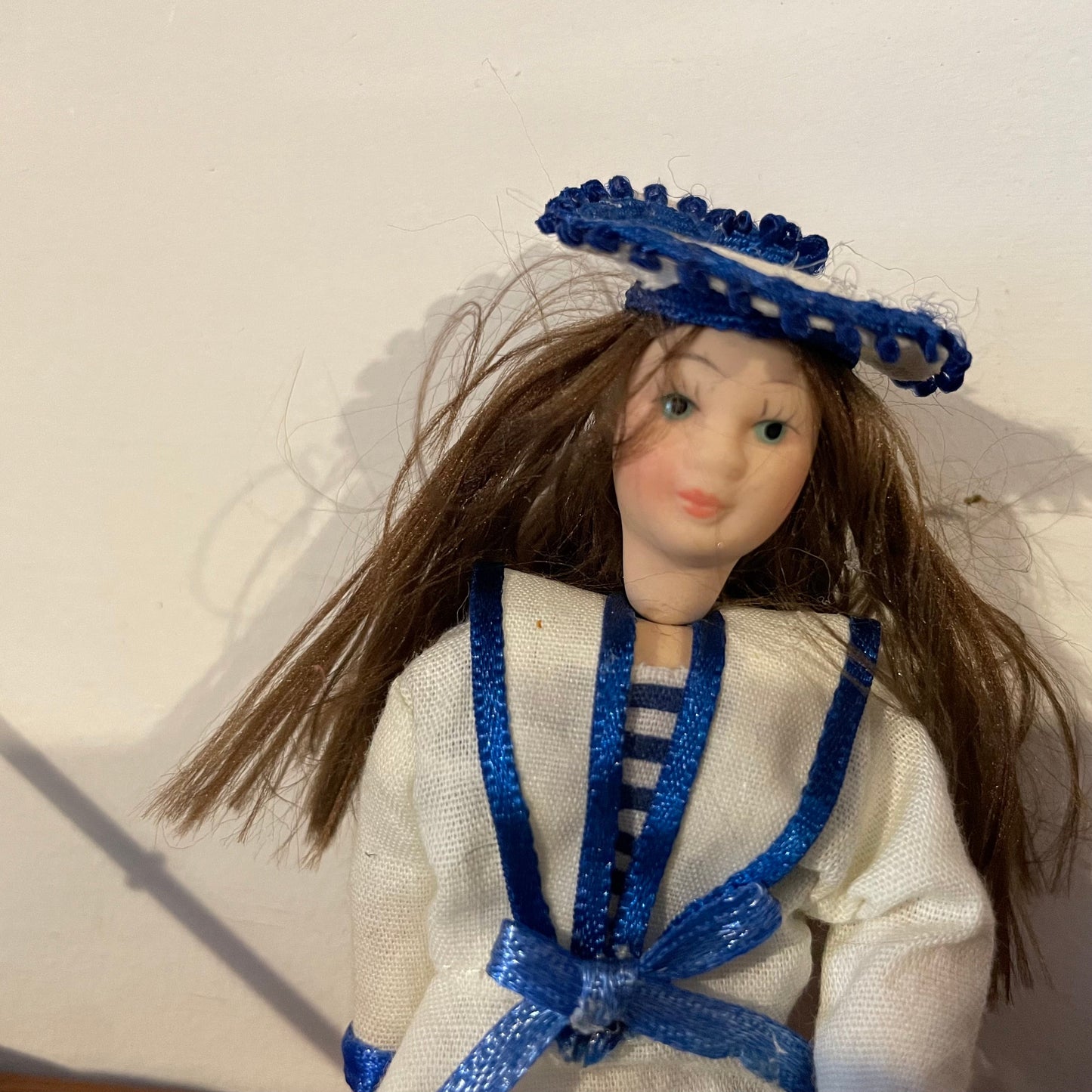 Dolls House Furniture Girl in Sailor Outfit Ceramic with Accessories. Vacuum, Telephone, Parasol, Umbrella