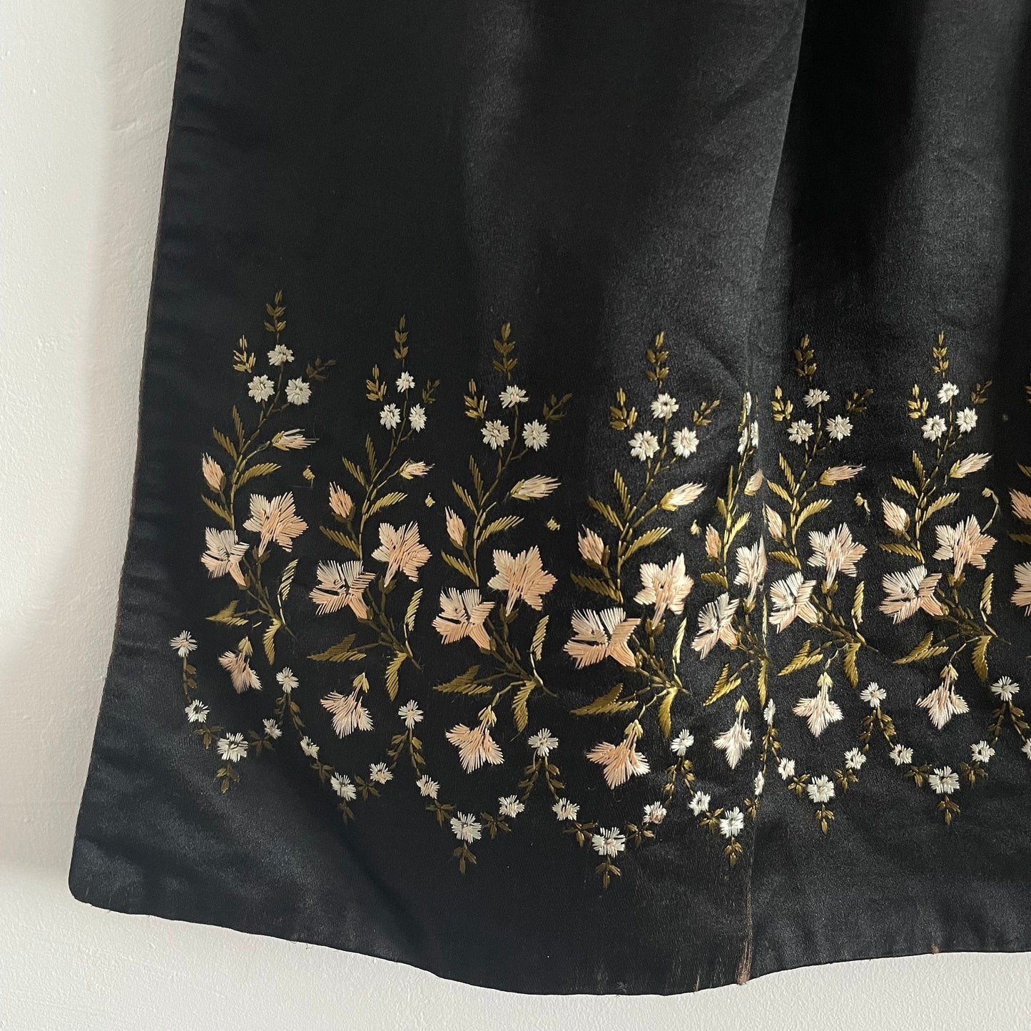 Antique Black Children's Apron with Pink and Green Embroidery