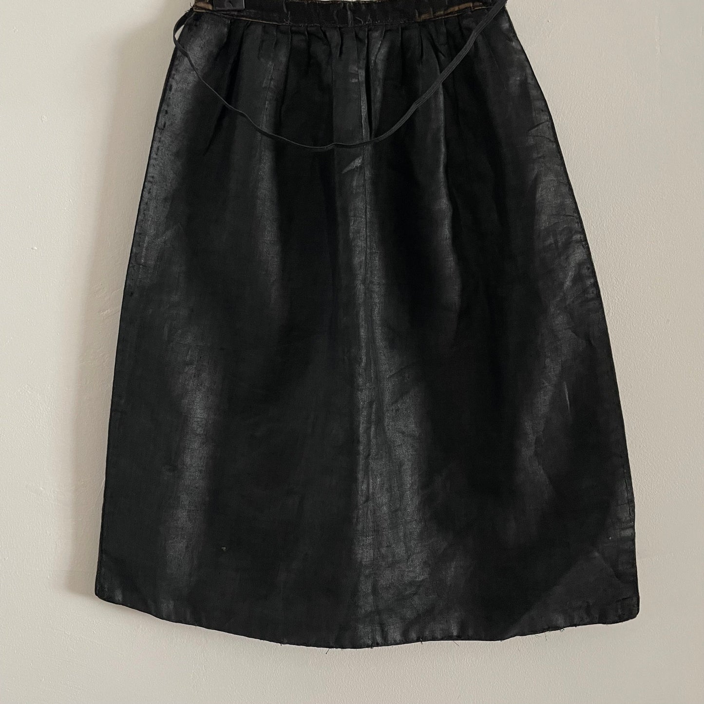 Antique Black Children's Apron with Pink and Green Embroidery