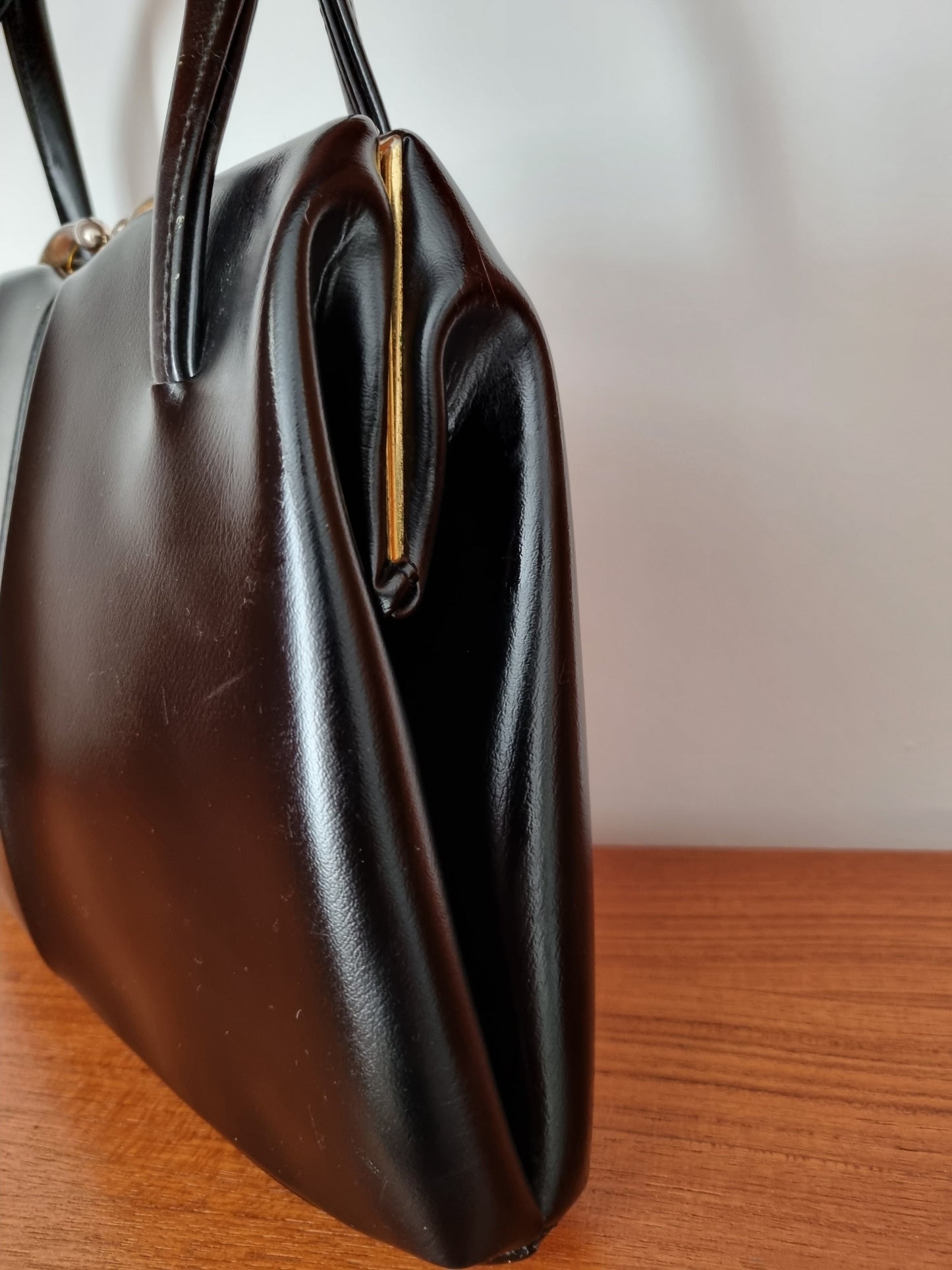 Black Structured Kelly Leather Handbag Vintage Statement Piece