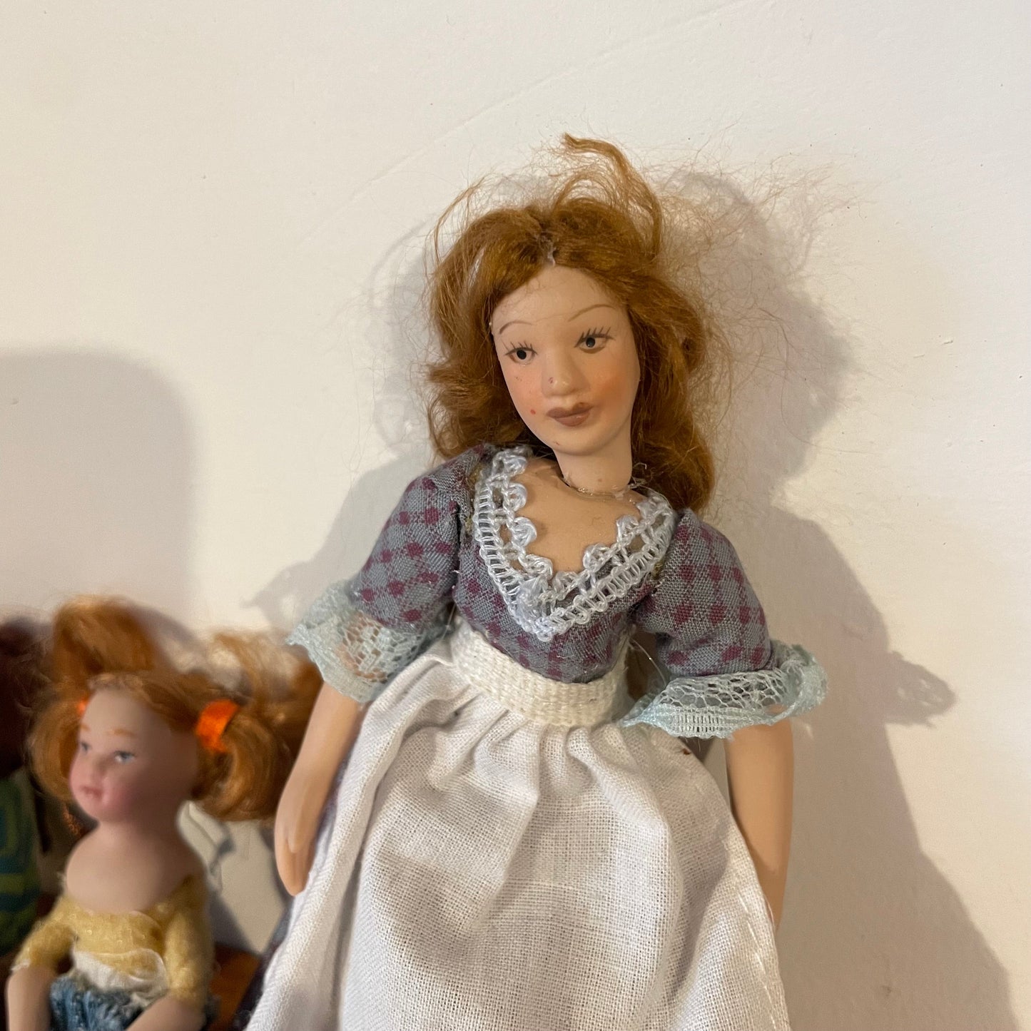 Dolls House Furniture Dolls Mother, Boy, Girl Family. Set of Three Ceramic People