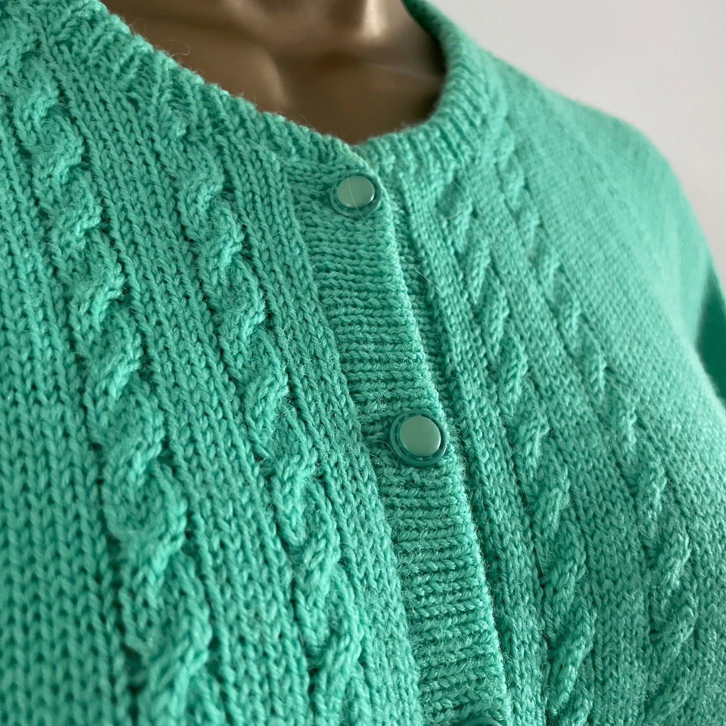 Vintage bright green hand knitted cardigan with short sleeves and round neck