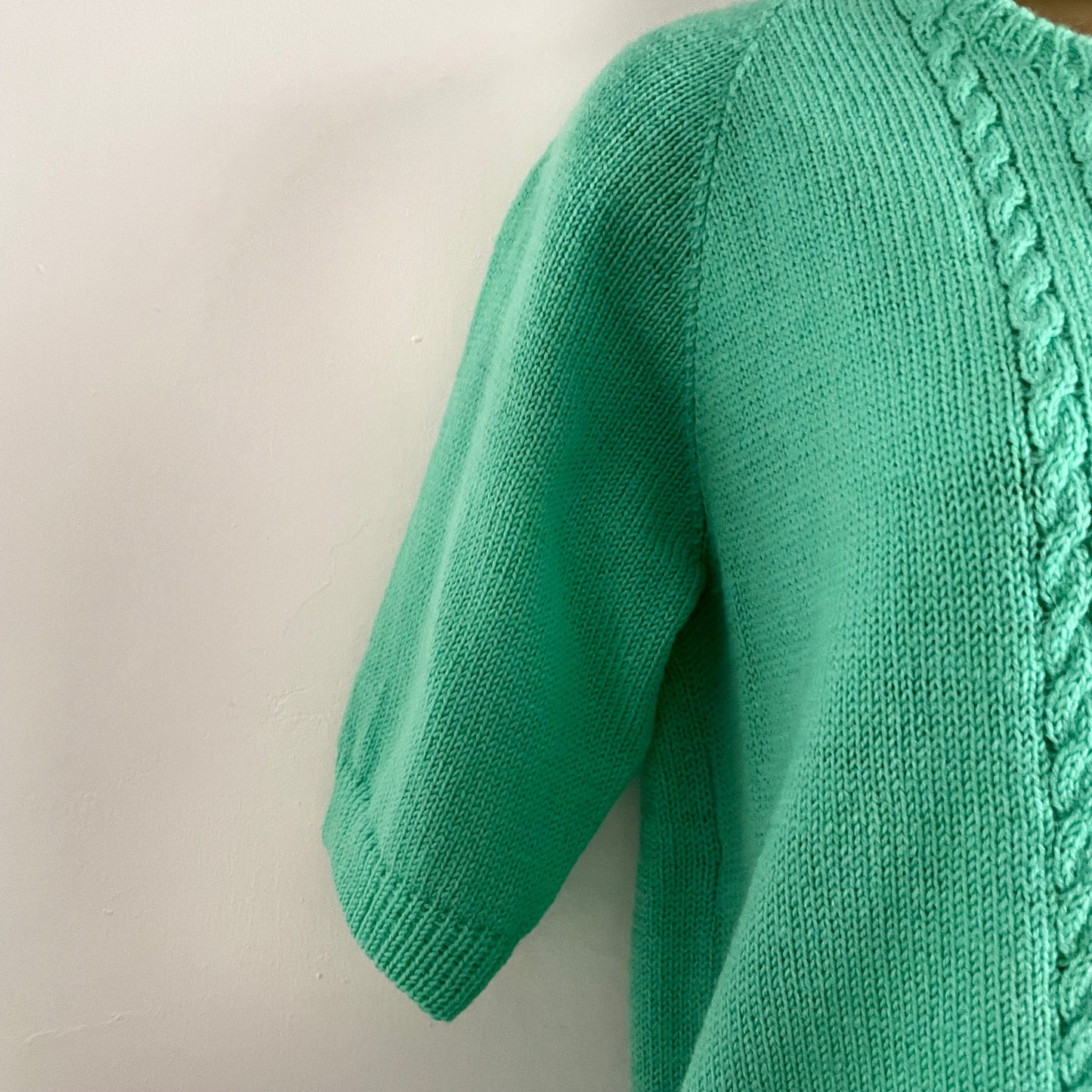 Vintage bright green hand knitted cardigan with short sleeves and round neck