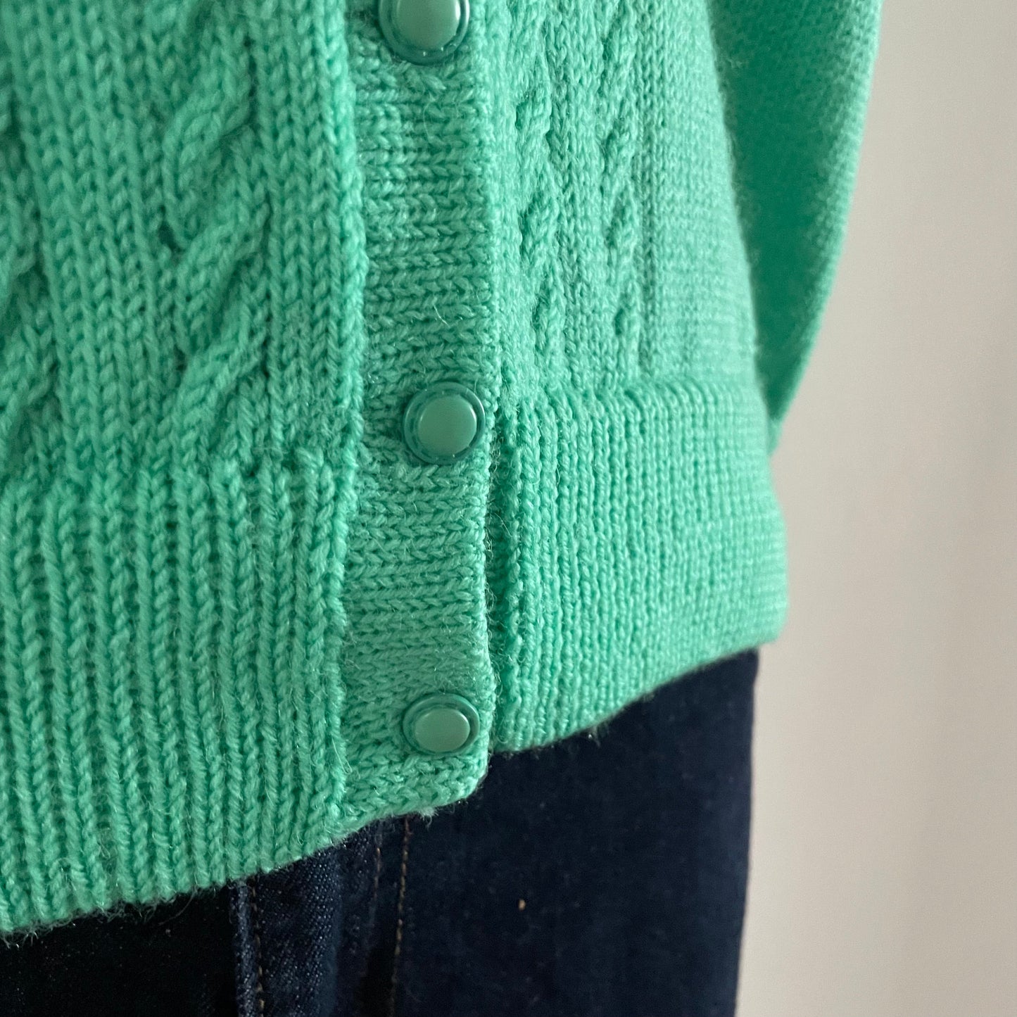 Vintage bright green hand knitted cardigan with short sleeves and round neck