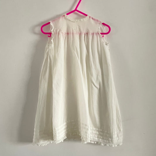 White embroidered baby dress sleeveless bottom fastening