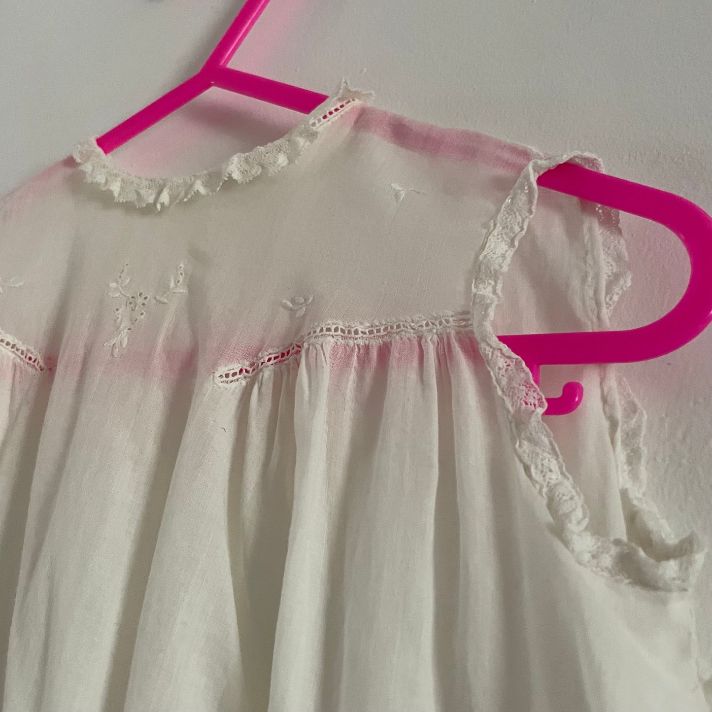 White embroidered baby dress sleeveless bottom fastening