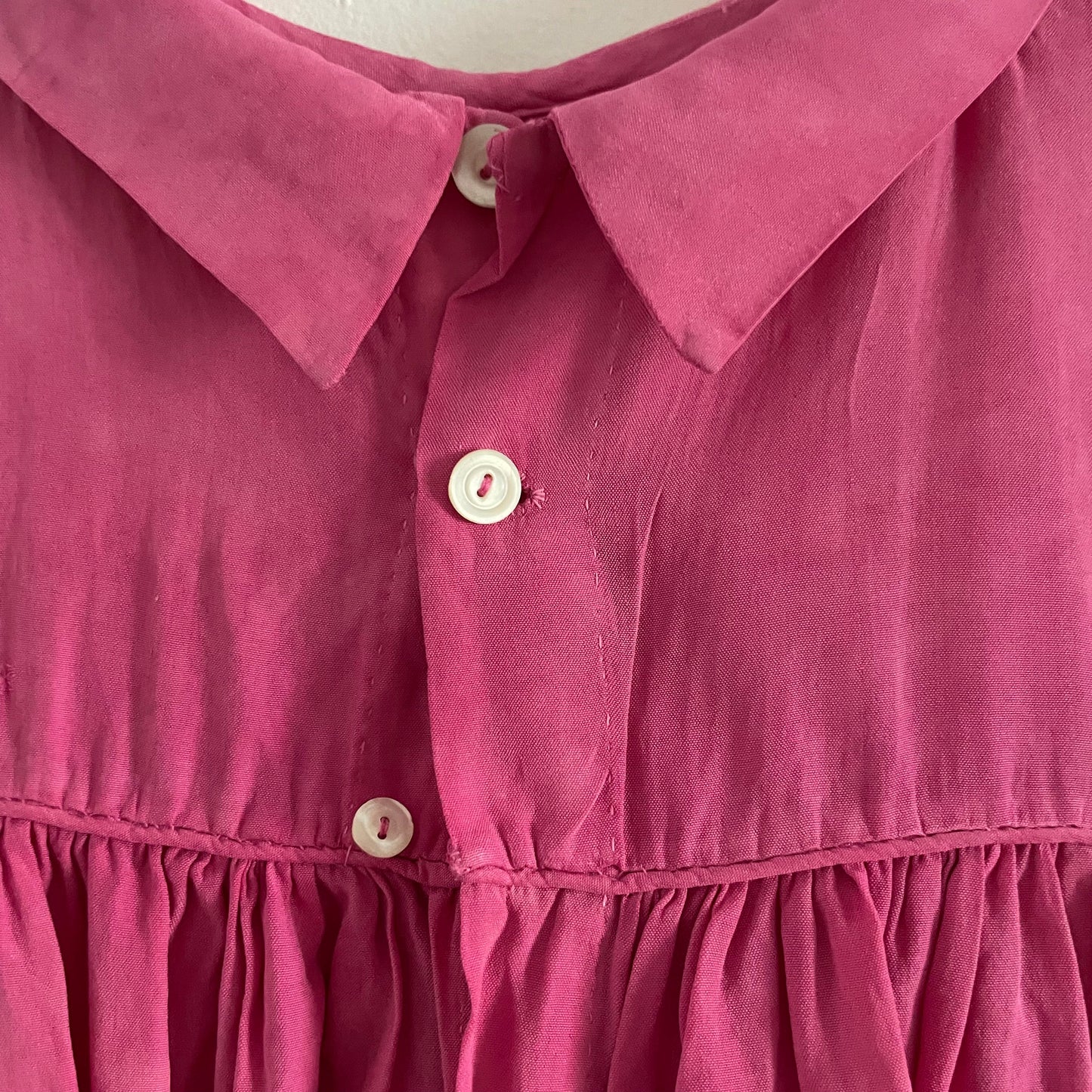 Hand dyed pink baby vintage children’s smock dress with collar and floral embroidery