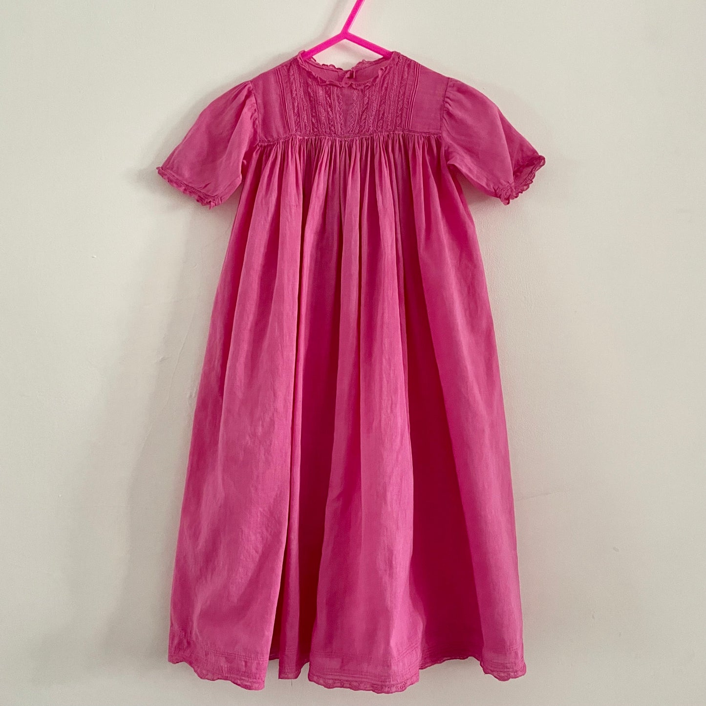 Hand dyed pink baby vintage children’s smock dress with lace detail