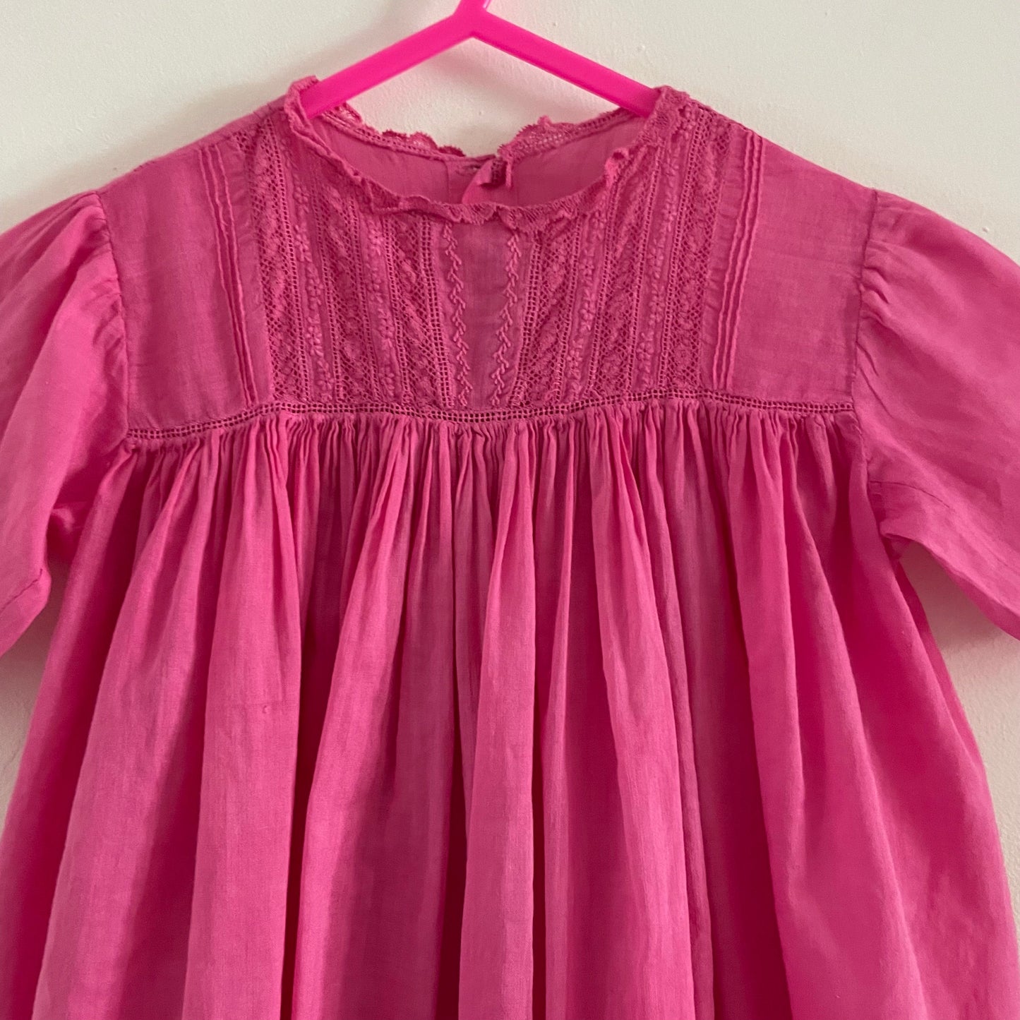 Hand dyed pink baby vintage children’s smock dress with lace detail