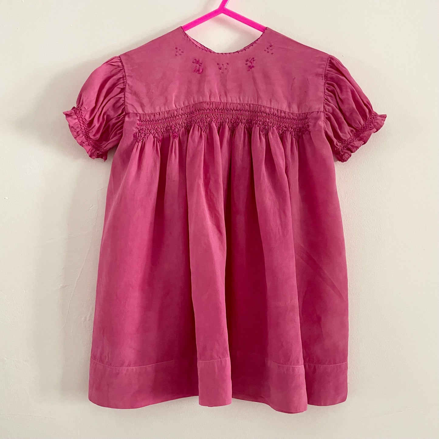 Hand dyed pink baby vintage children’s smock dress with stitched detail