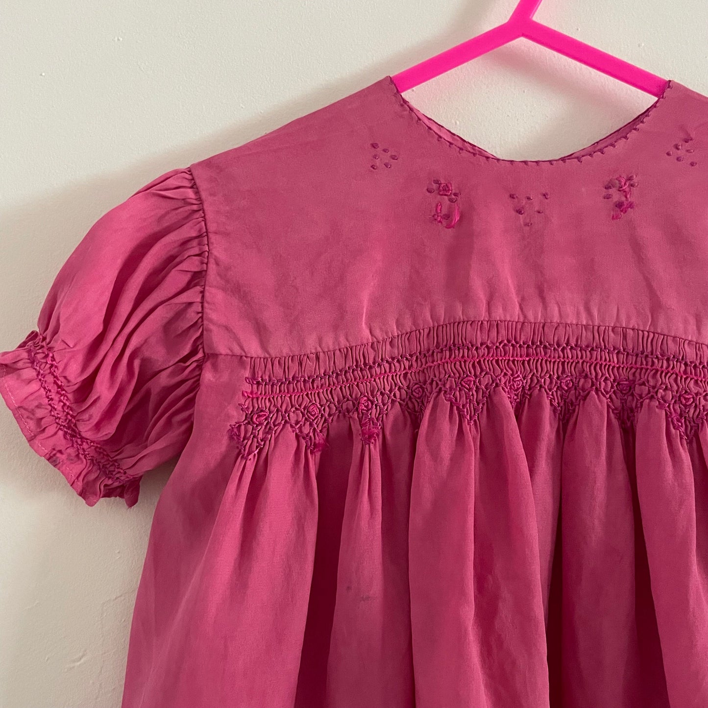 Hand dyed pink baby vintage children’s smock dress with stitched detail