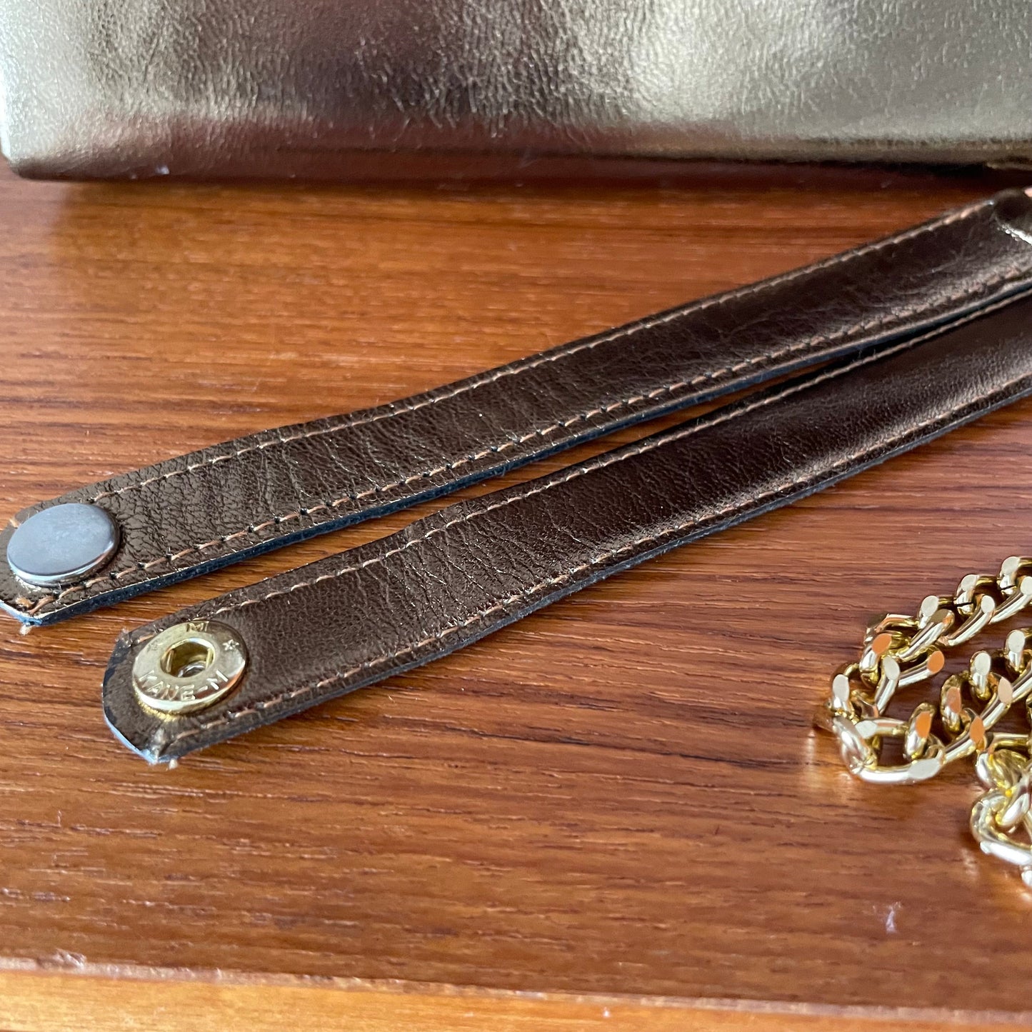 Vintage Gold Top Handle Handbag with Elephant Hardware and Detachable Shoulder Strap