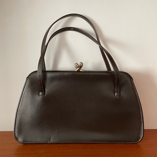 Elegant Beautiful Brown Leather Peter M Alan Of London Handbag Top Handle, showcasing timeless craftsmanship and style.