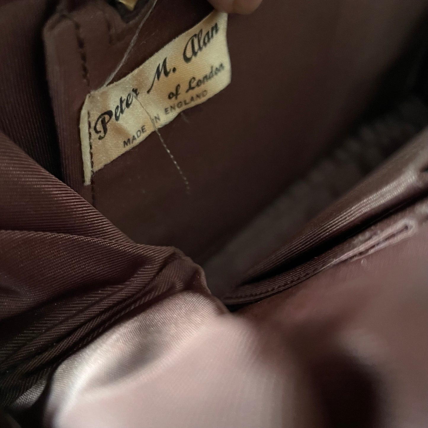 Inside view of the Beautiful Brown Leather Peter M Alan Of London Handbag Top Handle, showcasing its elegant craftsmanship.