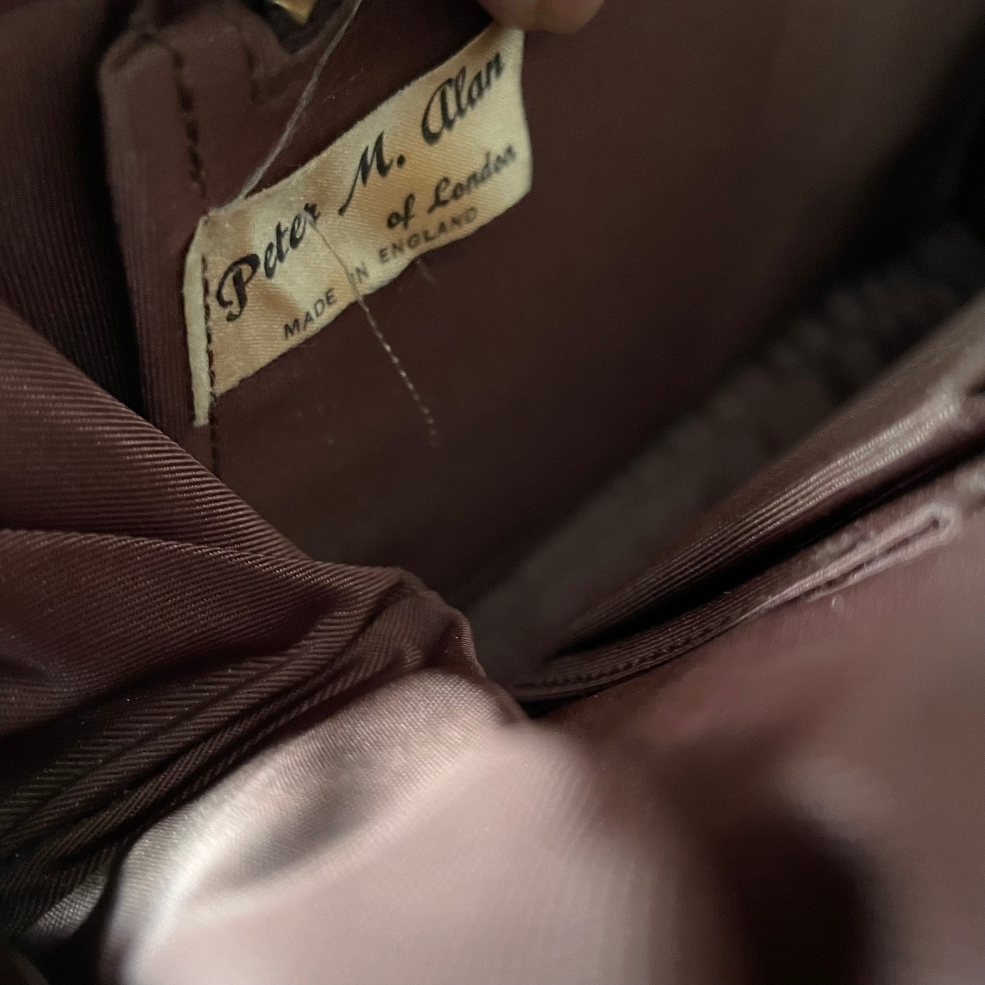 Inside view of the Beautiful Brown Leather Peter M Alan Of London Handbag Top Handle, showcasing its elegant craftsmanship.