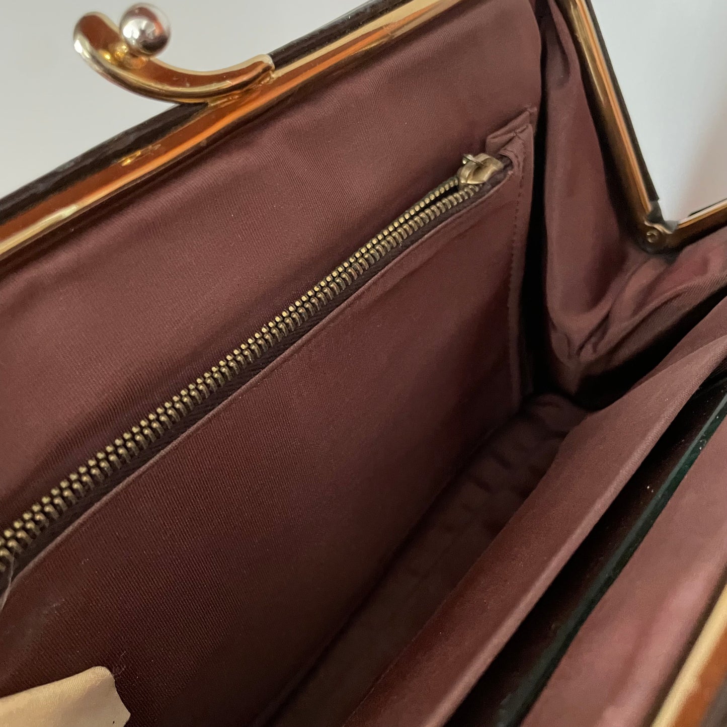 Discover the interior of the Beautiful Brown Leather Peter M Alan Of London Handbag Top Handle, blending elegance and functionality.