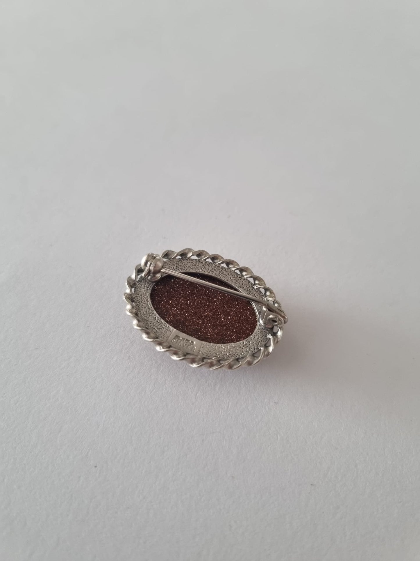 Vintage Goldstone Silver 1950s Brooch. Oval and Rope Outer Setting. Stamped Silver.