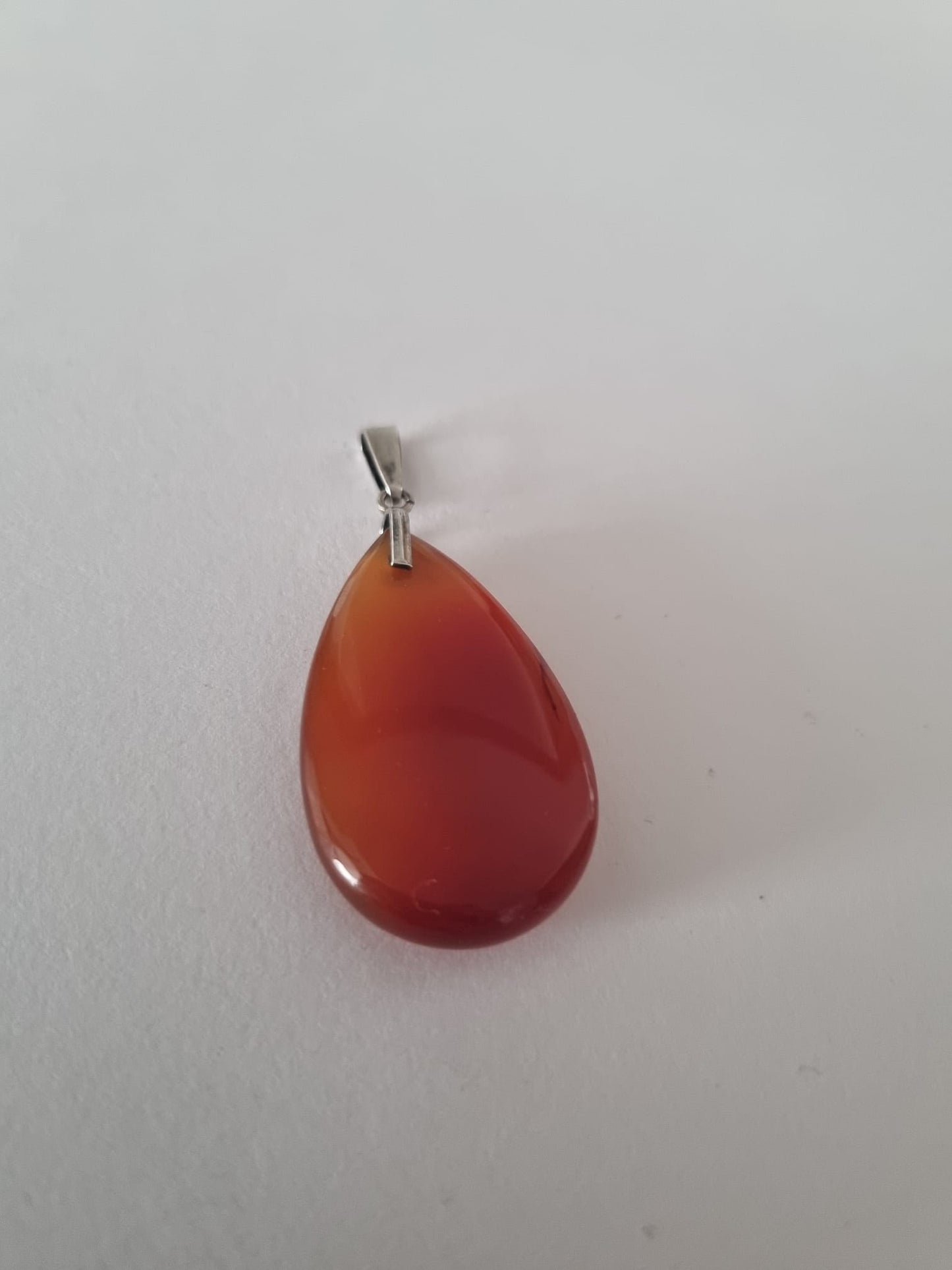 Vintage art deco sterling silver & polished carnelian gemstone pendant. Orange tones. Excellent condition