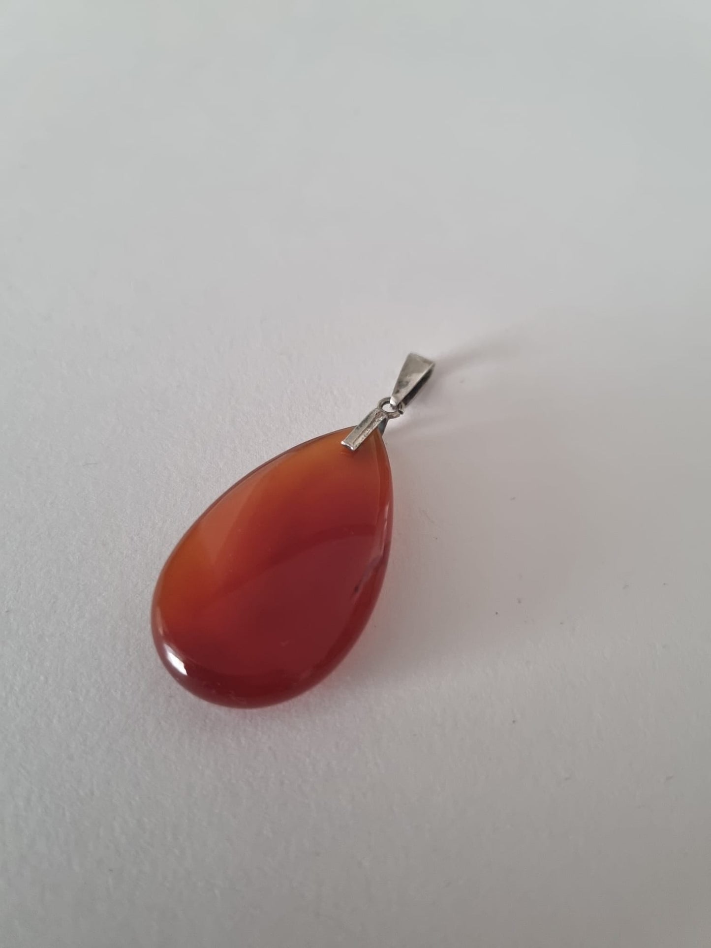 Vintage art deco sterling silver & polished carnelian gemstone pendant. Orange tones. Excellent condition