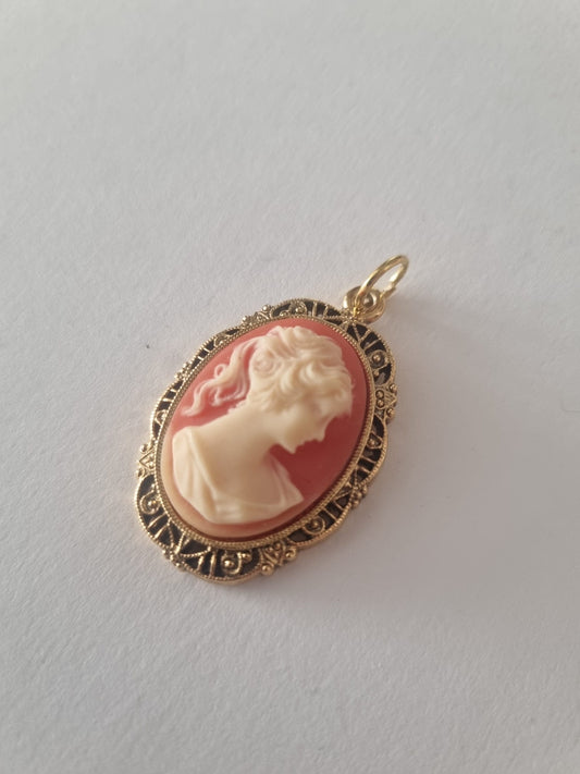 Vintage Pink Lady Silhouette Cameo gold tone detailed pendant with detailed back.