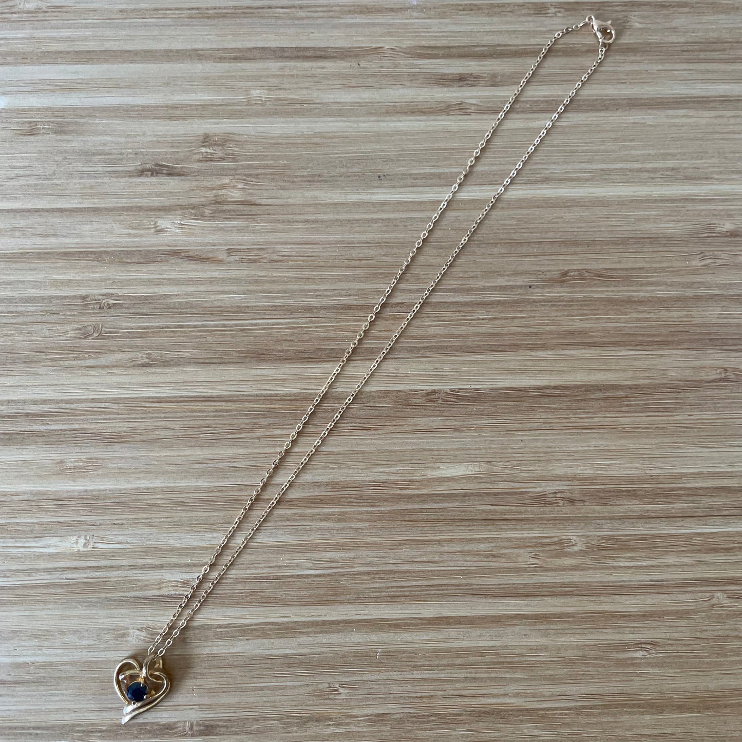 Necklace Vintage Gold Tone Heart Swirl with Black Stone Pendant Necklace. With Gold Plated Chain.